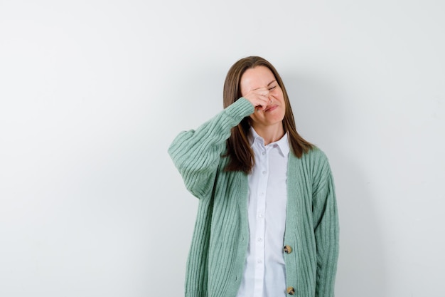 Expressive young woman posing in the studio