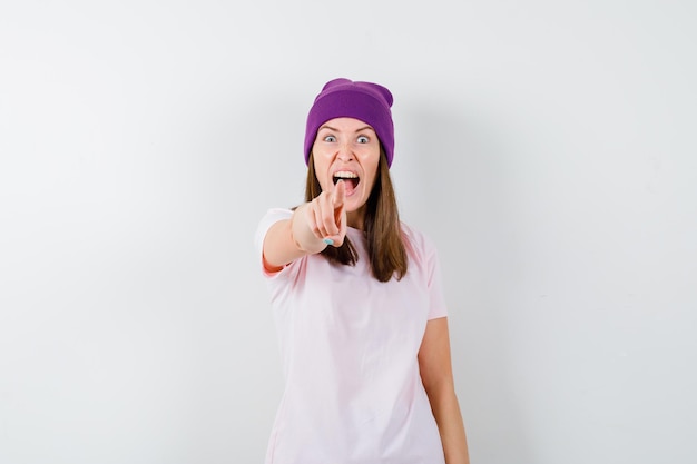 Expressive young woman posing in the studio