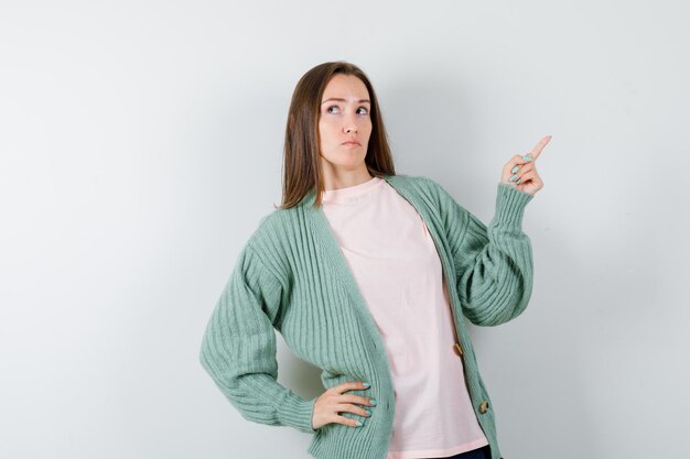 Expressive young woman posing in the studio