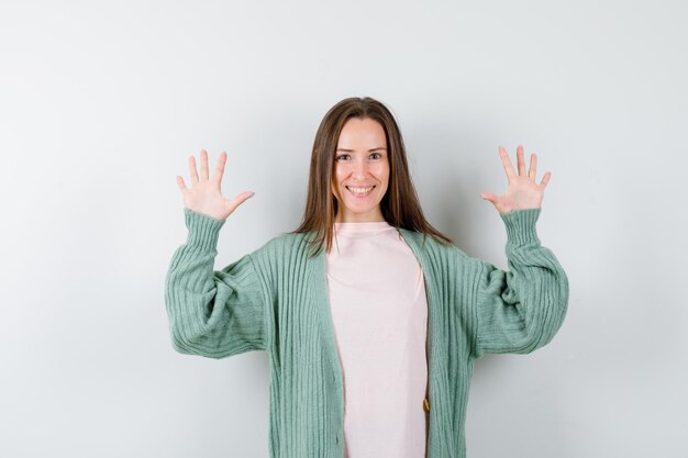 Expressive young woman posing in the studio