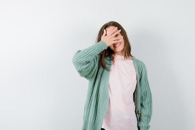 Expressive young woman posing in the studio