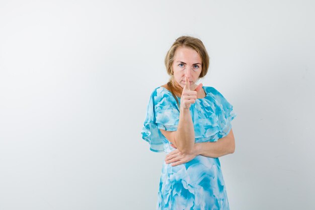 Expressive young woman posing in the studio