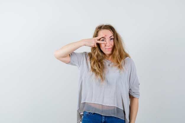 Expressive young woman posing in the studio