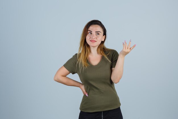 Expressive young woman posing in the studio