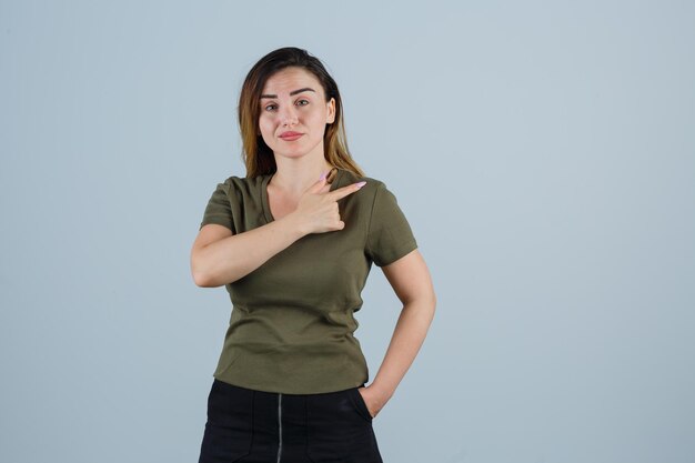 Expressive young woman posing in the studio