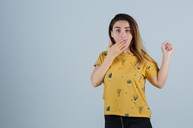 Expressive young woman posing in the studio