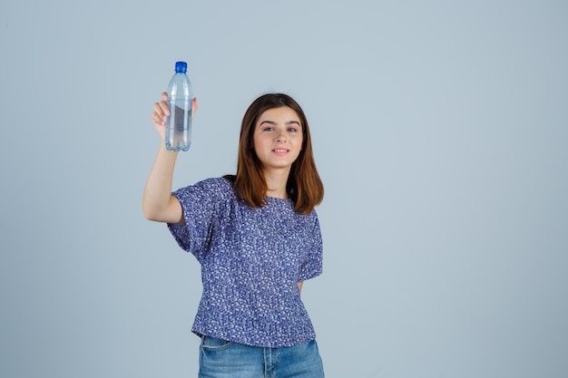 Expressive young woman posing in the studio