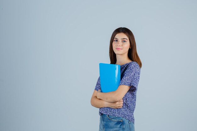 Expressive young woman posing in the studio