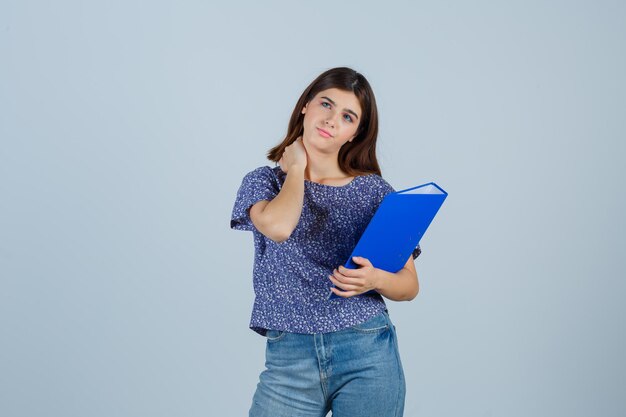 Expressive young woman posing in the studio