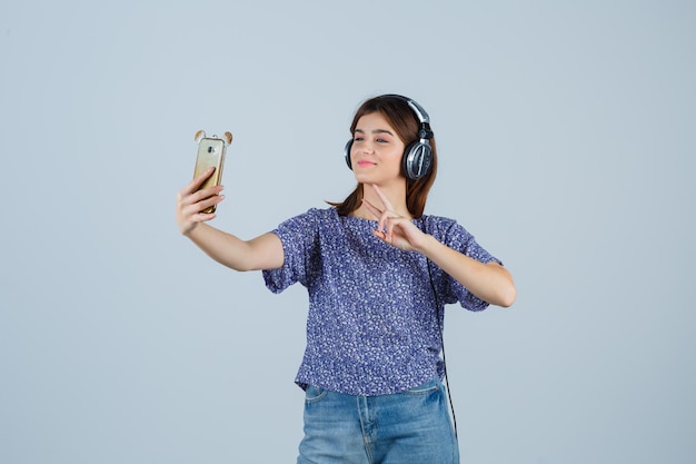 Expressive young woman posing in the studio