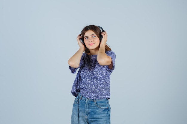 Expressive young woman posing in the studio