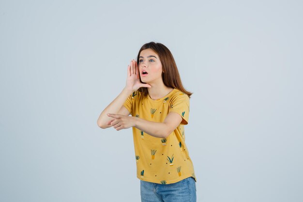 Expressive young woman posing in the studio