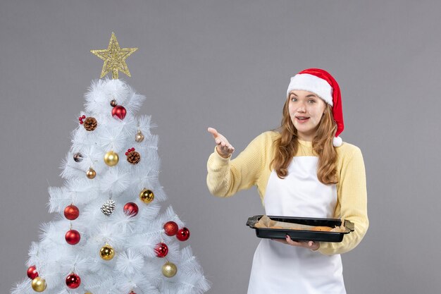 Expressive young woman posing for winter holidays