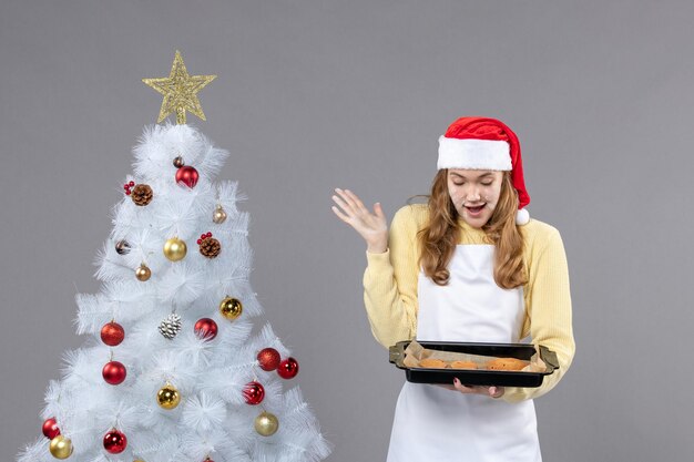 Expressive young woman posing for winter holidays