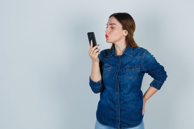 Expressive young woman posing