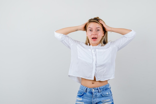 Expressive young woman posing