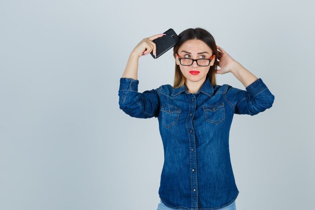 Expressive young woman posing