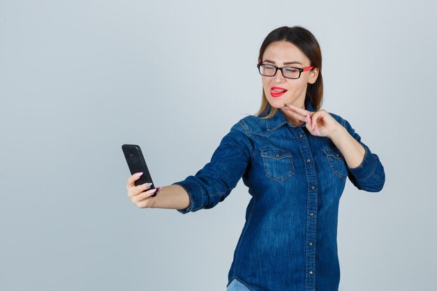 Expressive young woman posing