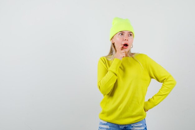 Expressive young woman posing