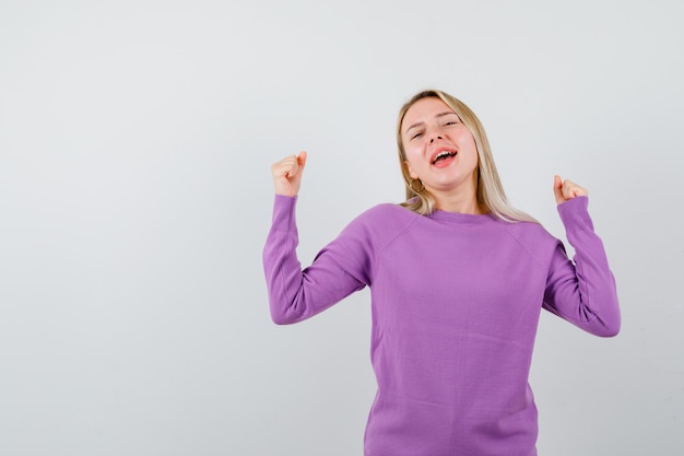 Expressive young woman posing