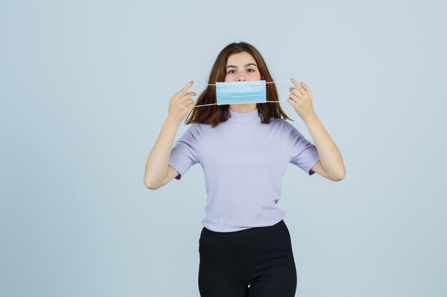 Expressive young woman posing