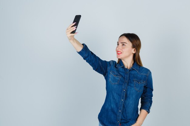 Expressive young woman posing