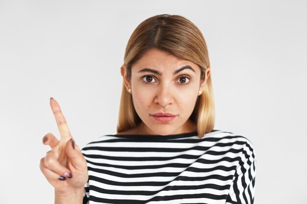 Expressive young woman posing