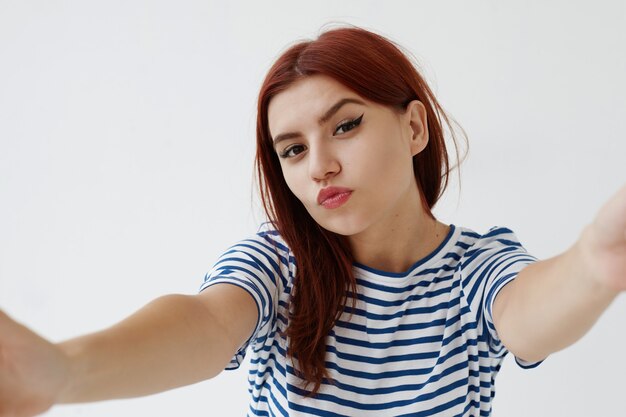 Expressive young woman posing