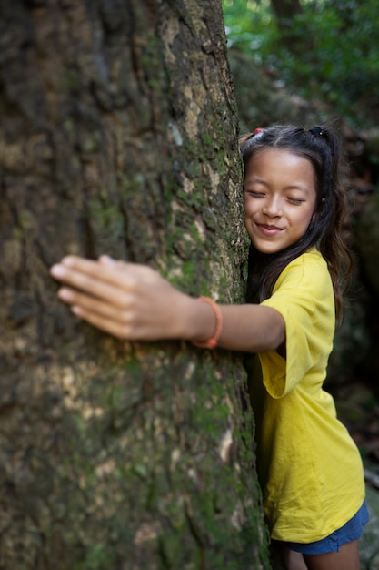 Free photo exterior portrait of kid for world environment day