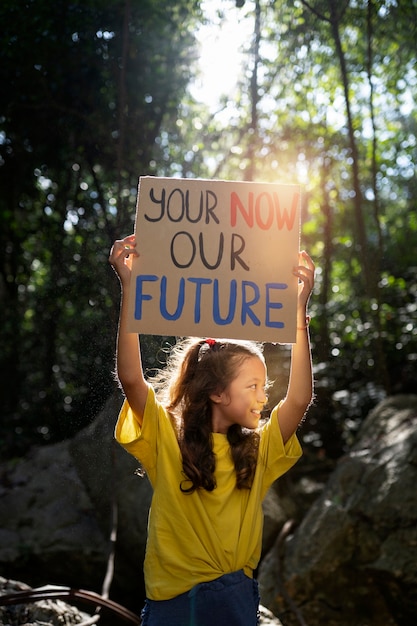 Exterior portrait of kid for world environment day