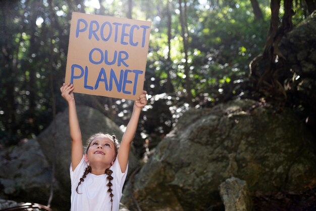 Exterior portrait of kid for world environment day