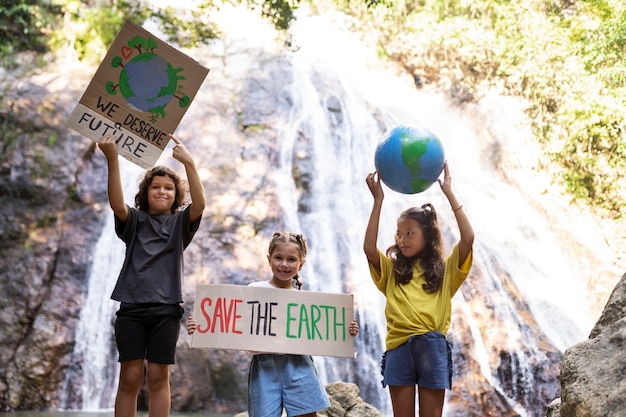 Free Photo exterior portrait of kids for world environment day