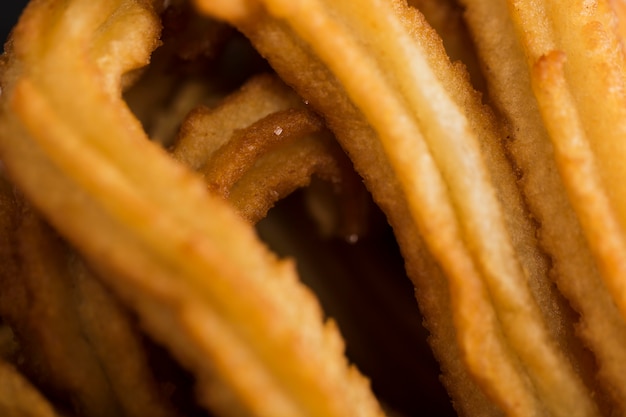 Free photo extreme close-up fried churros