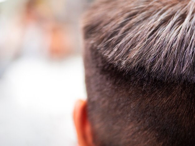 Extreme close-up of man with new haircut