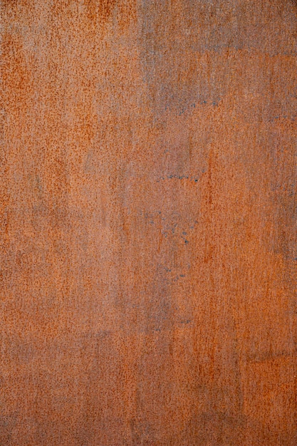 Free photo extremely close-up rusty brown iron wall