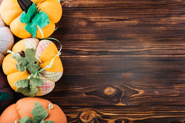 Free photo fabric pumpkins on table