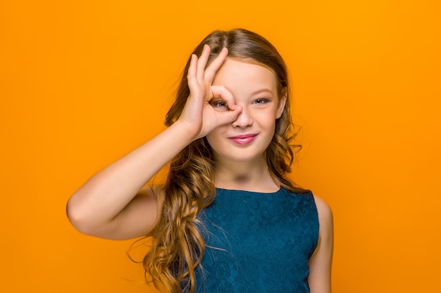 Free photo face of playful happy teen girl