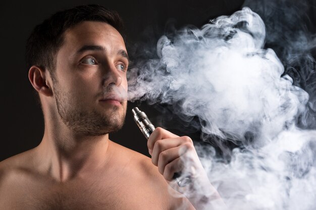 face of vaping young man