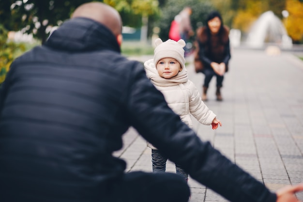 Free photo family in a autumn park