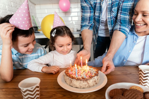 Family celebrating birthday close up