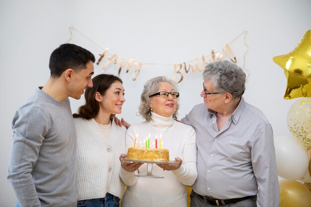 Family celebrating birthday medium shot