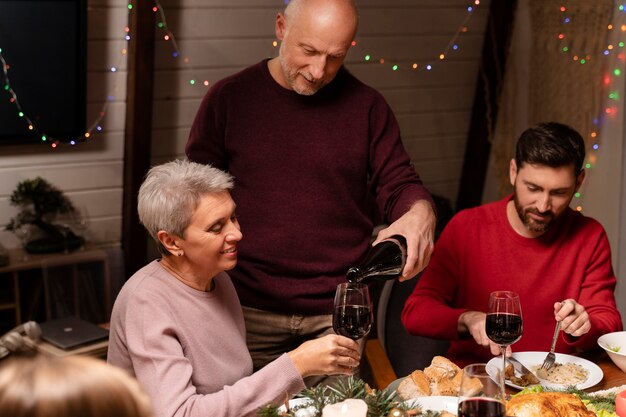 Family celebrating at a festive christmas dinner