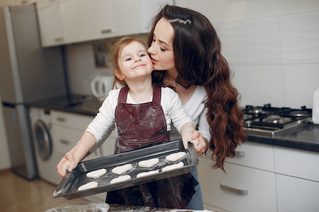 Free Photo family cook the dough for cookies