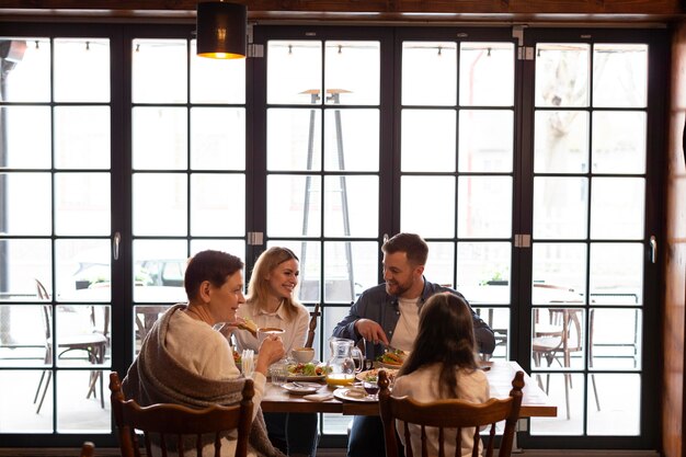 Family eating together at table