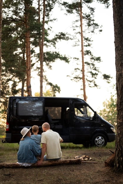 Free photo family enjoying time in camping site