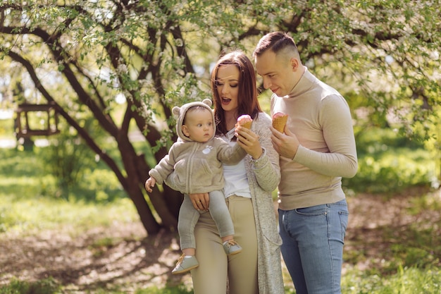 Free photo family enjoying walk in park