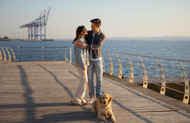 Family hanging out on a jetty