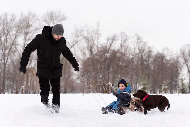 Family having fun in the snow