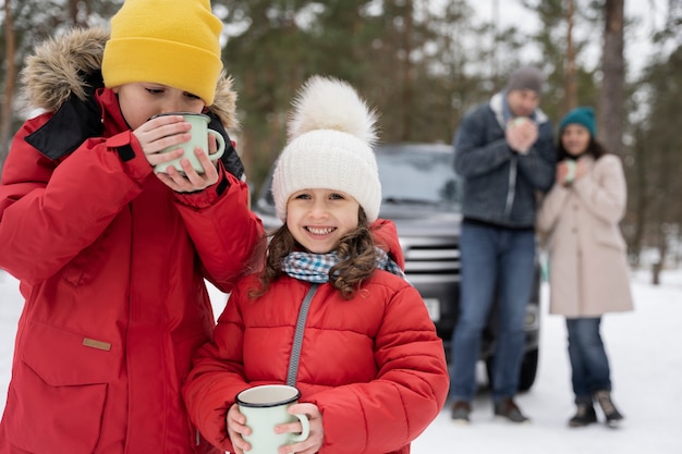 Family having fun during winter roadtrip