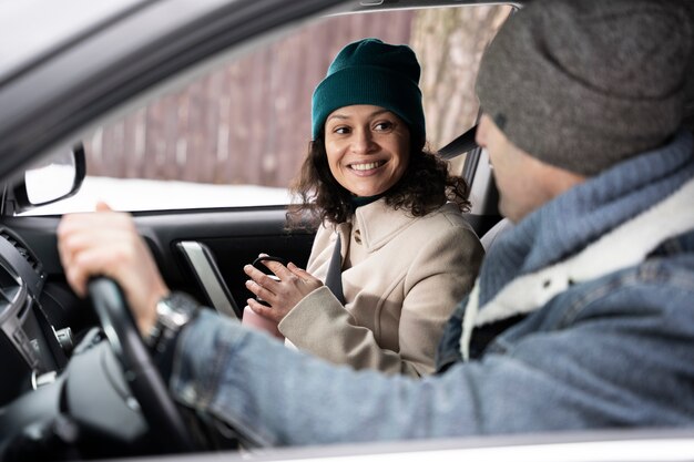 Family having fun during winter roadtrip